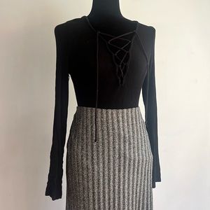 Black cross-cross tie front long sleeve rubbed top in back by Urban Outfitters